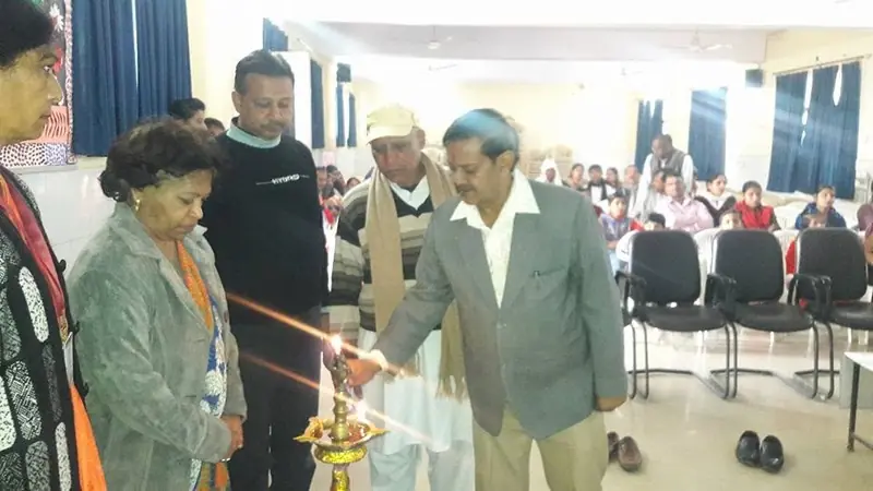 Lighting the lamp at a D.A.V. Public School, Palwal event, December 2017